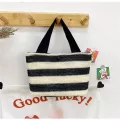 กระเป๋าถือสุภาพสตรี The new hand woven straw handbag fashion hand bag beach bag