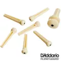 D'Addario® PWPS12 หมุดกีตาร์โปร่ง สีงาช้างจุดดำ วัสดุพลาสติก ABS คุณภาพสูง 1 แพ็ค มี 7 ตัว