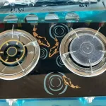 เตาแก๊สหน้ากระจก Sunshine สวย หรูหรา ทนทาน หัวหนาพิเศษ หัวเตา 2 ด้านไม่เหมือนกัน ด้านหนึ่งหัวอินฟาเรท อีกด้านหัวทองเหลืองขึ้นไฟ ใช้งานง่าย หรูหราทนทาน