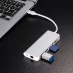 8-in-1 MacBook ชนิด c ศูนย์กลางเป็น HDMI + RJ45 + USB3.0 * 2 + อ่านการ์ด + USB-C แท่นวาง