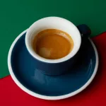 Genuine coffee beans roasted Kim Bo Intenso 250 grams, imported from Italy.