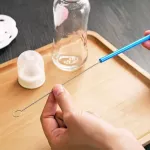 Silver tube washing brush for children's drinking tubes