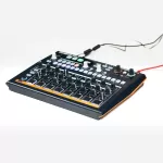 Arturia® DrumBrute Impact Drum Machines Drum Machines with 10 drum sounds 64 steps. Pat. There are Distortion + free added effects.