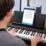 Roland® FP-30X เปียโนไฟฟ้า 88 คีย์ ลิ่มแบบ Hammer Action มีเสียง 56 เสียง ต่อบลูทูธ/MIDI/USB ได้ + ฟรีอแดปเตอร์ & แป้นเห