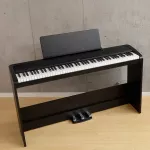 Korg® B2SP Piano Fah Piano Digital 88 Key Steer Speaker Key Steer has a USB connector in a black computer + with a stand and pedal.