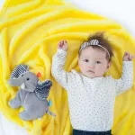 Soft, soft yellow blanket with gray elephant doll