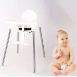 Baby dining table The chair eats tall rice with foot rest.