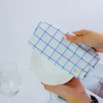 The plate towel has ears, hanging, table, glass towels, multi -purpose towels. Cleaning towels