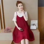 Red maternal dress ready to deliver