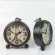 นาฬิกาปลุกเหล็กดัดสไตล์ยุโรปย้อนยุคขอบบรอนซ์นาฬิกาตั้งโต๊ะปิดเสียงสีดำนาฬิกาปลุก TH34168