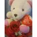 ตุ๊กตาหมีสีครีม ประดับบนช่อดอกกุหลาบสีแดง ของขวัญวันวาเลนไทน์ ของขวัญวันครบรอบ