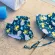BUMKINS swimming trunks come with a hat. Swim Set has a site 6, 12, 18, 24 months.