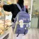 Four pieces of student bags, lightweight backpacks, three to six grades, large capacity, backpack, high school student