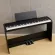 Korg® B2SP Piano Fah Piano Digital 88 Key Steer Speaker Key Steer has a USB connector in a black computer + with a stand and pedal.