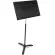 Manhasset Director by Millionhead, a music note stand Is a three -legged stand With a wide and stable base With a central channel to store documents or books