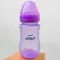 Avent Natural milk bottle lid (converted to a wide neck). Read before pressing.