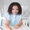 BUMKINS Short Sleeve Smock model is suitable for 3-7 years. There are many designs to choose from.